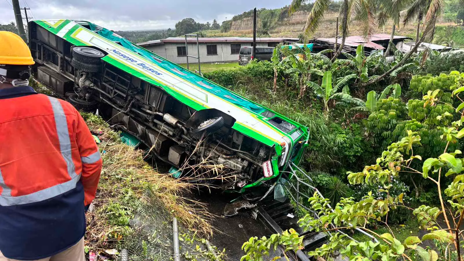 A Nasese bus veered off the highway and ended up in a roadside ditch inside a church compound.