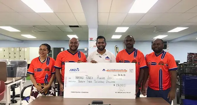 R.C. Manubhai & Co. PTE Limited’s group marketing manager Atish Kumar Singh (second from left) seals the deal with Nasinu Touch Rugby Association officials in Suva on June 30, 2023. Photo: Supplied 