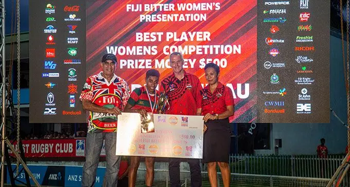 46th Fiji Bitter Marist sevens women player of the tournament Reapi Uluinasau with her prize. Photo: Leon Lord