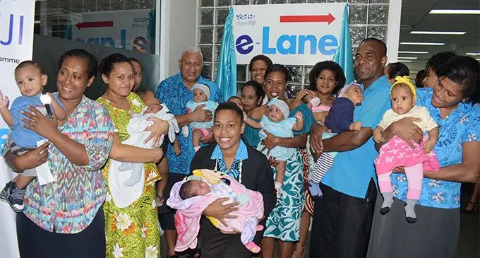 PAVING THE WAY FOR OUR FUTURE GENERATION ... Prime Minister Voreqe Bainimarama and Minister for Women, Children and Poverty Alleviation Meresaini Vuniwaqa with parents and their babies during the Birth Certificate App launch at Suvavou House on April 12, 2019. Photo: Ronald Kumar