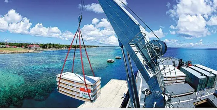 Relief supplies are unloaded in Tonga from a Chinese naval vessel after the Pacific island nation was hit by a volcanic eruption and tsunami in January, 2022. /Xinhua