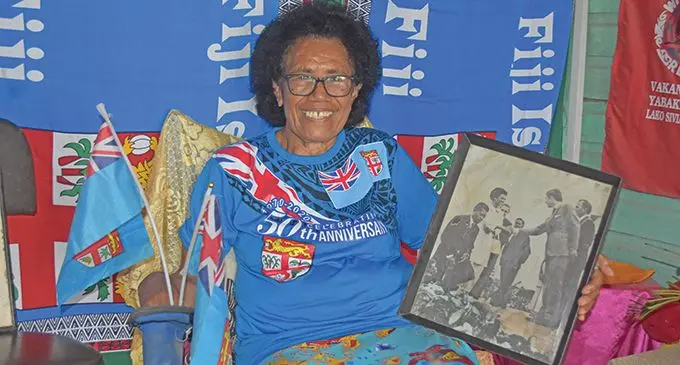 Kelera Vukicanagauna Tuiwainikai holding a frame of her shaking hands with Prince Charles in Lautoka on October 10 1970 while at home in Nakorowiri in Labasa on October 6,2020. Photo: Laisa Lui