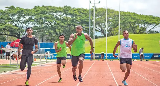 Sprint king Banuve Tabakaucoro takes out the 100m during the Easter Athletics games at the ANZ National stadium in Suva on the 3rd April 2021. Photo: Leon Lord