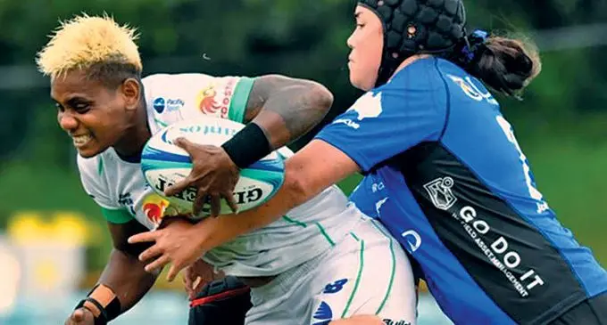 Rooster Chicken Fijiana Drua back Roela Radiniyavuni (with ball) tries to escape a Western Force tackle in their Super W clash at Leichhardt Oval in Sydney, Australia, on March 19, 2022.