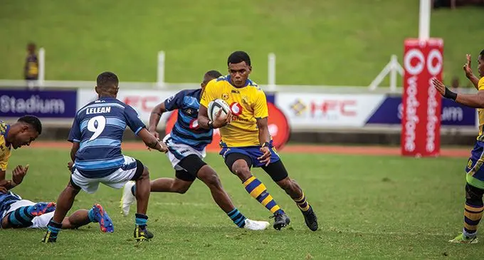 Suva Grammar School Victor Sigavou (with ball) on attack against Lelean Memorial School during their Vodafone Deans National Under-18 quarterfinals at the HFC Bank Stadium, Suva on September 24, 2022. Photo: Leon Lord.