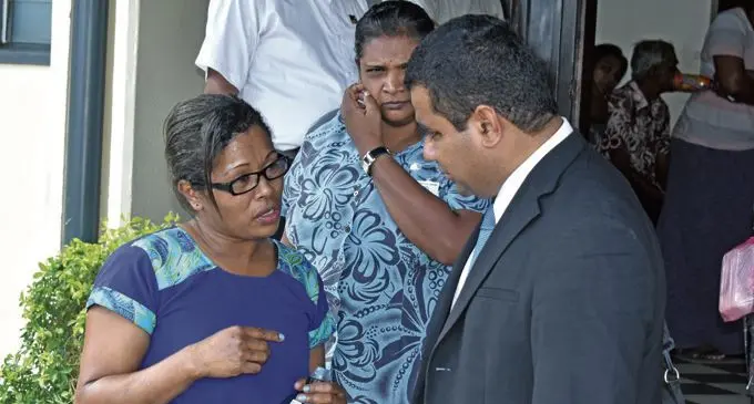 From right: Amele Wabale speaks to her lawyer, Mosese Raratabu outside the Nadi Magistrates Court on February 12, 2018.   Photo: Arieta Vakasukawaqa