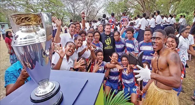 New Zealand Rugby Unit marketing manager, Nick Rowland among the St Thomas HigH School Under-16 girls’ rugby team and students after welcoming the Women’s Rugby World Cup in Lautoka on September 16, 2022. Photo: Nicolette Chambers