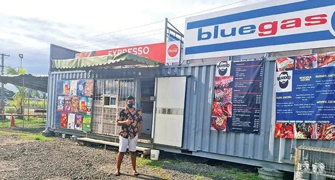 Lautoka businessman, Anushil Goundar outside his restaurant and shop.