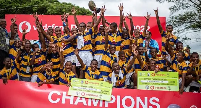 Ratu Kadavulevu School players celebrate winning the U15 competition of the Vodafone Super Deans Trophy at Churchill Park, Lautoka, today. Photo: Leon Lord