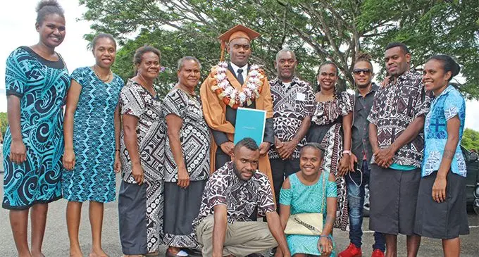 Richly Bule with family after the graduation at the FMF Gymnasium on March 21, 2019. Photo: Simione Haravanua
