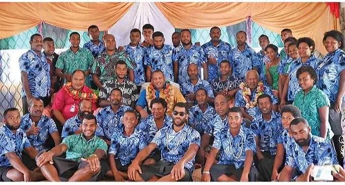 Minister for Rural and Maritime Development and Disaster Management Inia Seruiratu (wearing garland), with members of the Naitutu Village Transformation Youth Group at the village in Tailevu on December 16, 2021. Photo: DEPTFO News