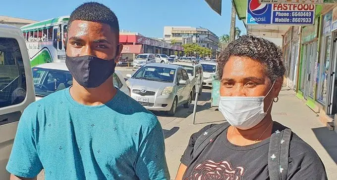 Sisa Macedru and his mother, Ana Naqelevuki, with the special chocolate cake he baked ready to be sold at Lautoka City.   Photo: Nicolette Chambers