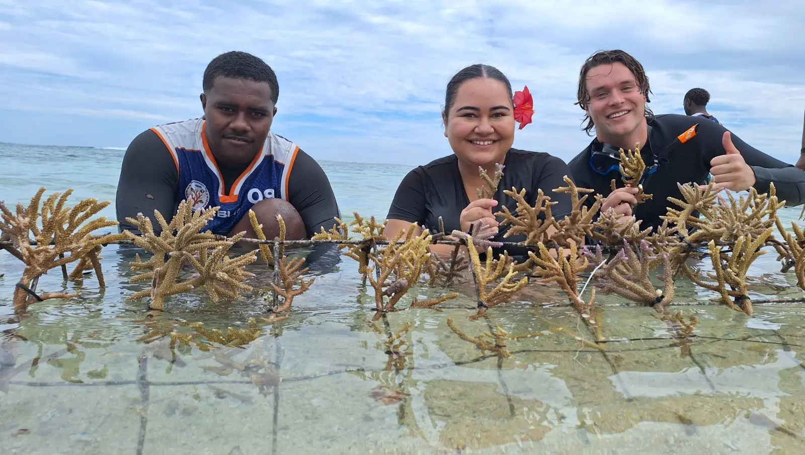 L-R: Youth Member Tomasi Rareba, Pacific climate leader Brianna Fruean, and Kal Glanznig during the Coral tree planting at Naidiri Bay, Nadroga, on October 5, 2026. Photo: Waisea Nasokia. 