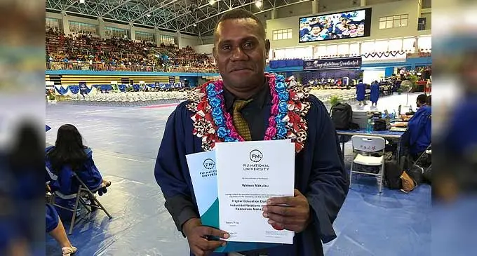 Waisea Makulau, with his diploma from the Fiji National University. Photo: Josefa Babitu
