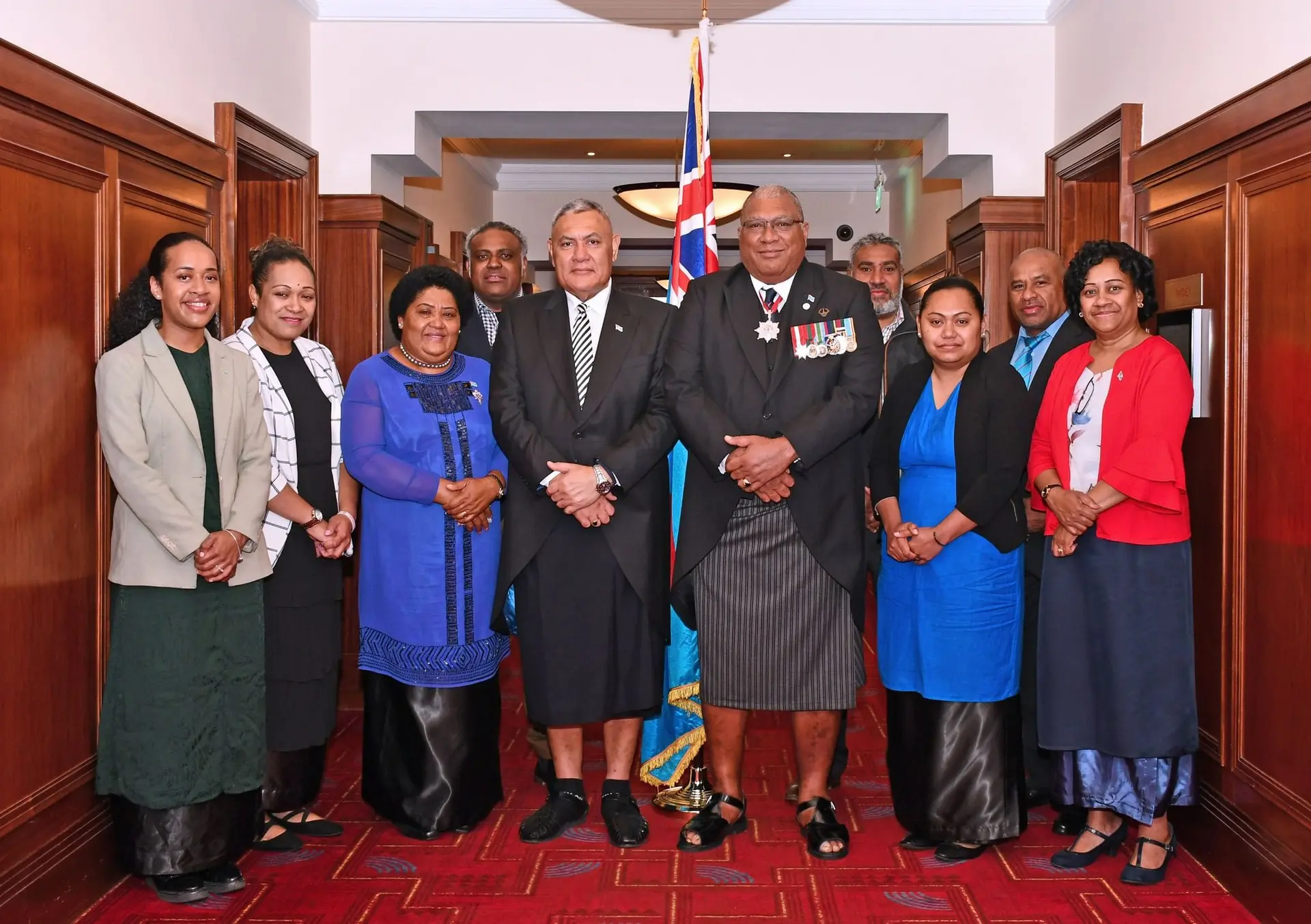 The President Ratu Wiliame Katonivere, First Lady Filomena Dikumete, (third from left), and Fiji’s High Commissioner to the United Kingdom Jitoko Tikolevu, (fifth from left), with staff members of the Fijian Mission in the U.K. before the coronation of King Charles III on May 6, 2023. Photo: Deptfo