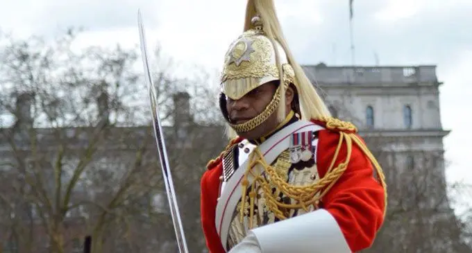 Peni Qio gets ready to escort the Duke and Duchess of Sussex, Prince Harry and Meghan Markle's procession through the streets pf Windsor after the royal wedding at St George's Chapel. Photo: Betty Chandra