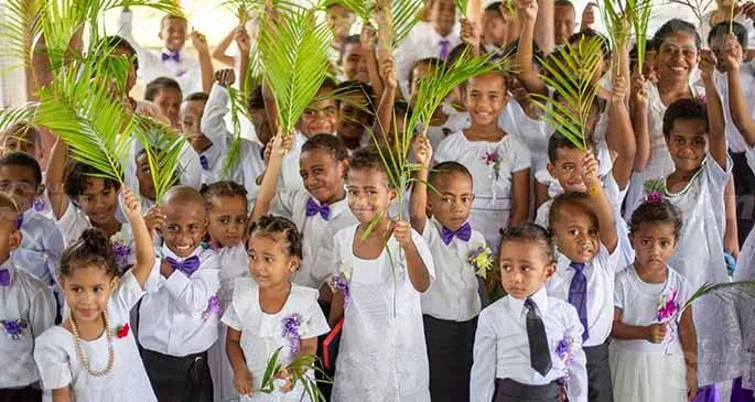 Children of Caqiri/Nasole Methodist Church celebrating Palm Sunday in Nasole on the 28th March 2021. Photo: Leon Lord