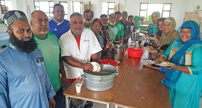 Masjid Ul Hilal Mosque head priest, Rameez Riza Ali (first from left) together with the members of the mosque and the women at the Eid Mela celebration at Saweni, Lautoka on May 22, 2022.  Photo: Nicolette Chambers 