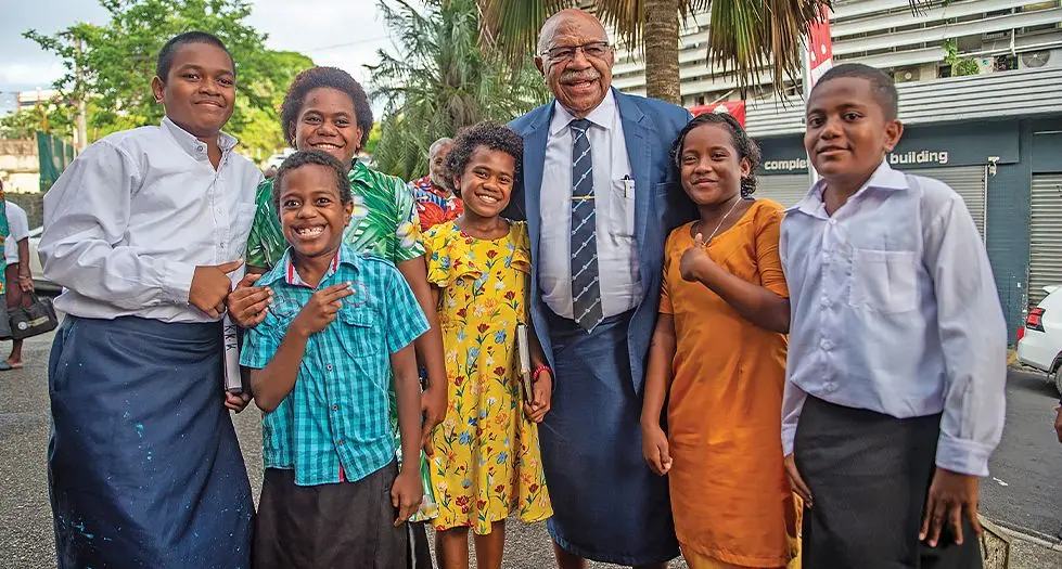 Prime Minister Sitiveni Rabuka with children at the Centenary Methodist Church on December 24, 2023. Photo: Leon Lord