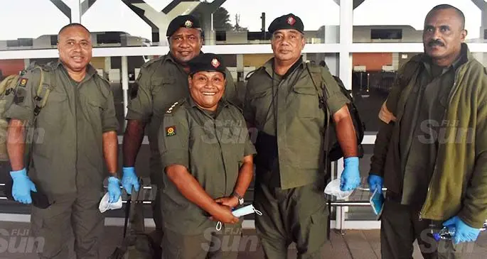Captain Ana Buliasewa (front) is flanked by Staff Sergeant Kalivati Uluibua, Peni Bula, Malakai Qase, and Tomasi Vatanitawake at the Nadi International Airport on June 23, 2020. Photo: Mereleki Nai