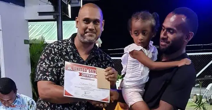 United Sangam FC's Sakaraia Naisua (right) receives his award on January 30, 2023. Photo: United Sangam FC