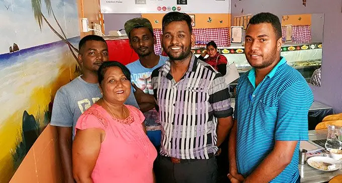 Front row, from left: Kelvin Pillai’s mother Reena Kumar, Kelvin Pillai, with close friend, Luke Tusoya.  Back row, from left: Brothers Kishan Pillay and Krishneel Pillay inside their Moody Foodie Fastfoods and Takeaways restaurant in Lautoka on August 1, 2020. Photo: Nicolette Chambers