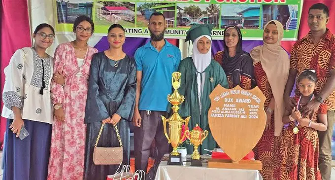 Labasa Muslim Primary School dux Fariza Ali (fifth from left) with her immediate family members during the prizegiving on November 28, 2024. 