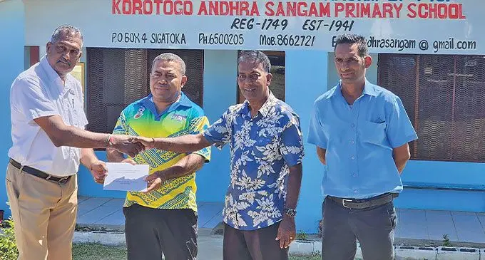 Warwick Fiji director of Human Resources Nitin Goundar handed-over the cheque to school management manager Ramesh Naidu, assistant head teacher Isireli Cama, and teacher Dinesh Prasad. Photo: Waisea Nasokia