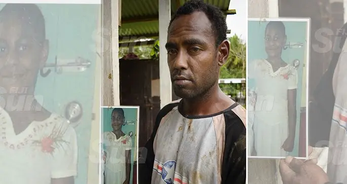 Autiko Kamai with the picture of his 12 year-old step-daughter Senimere Matavura, who died after jumping out of a moving van in Nabitu Village in Wainibukasi on October 8, 2019. Photo: Ronald Kumar