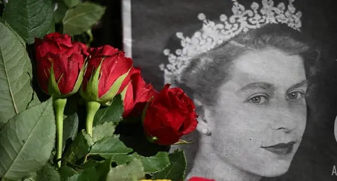 Flowers laid by well-wishers, two days after Queen Elizabeth II died at the age of 96. Photo: AFP