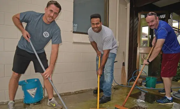 US Navy USS Shoup (DDG 86) crew members from left Liuteneant Jack Harris, Gunner Master Chief Branden Simmons and Petty Officer Tyler Hinrichs at the  Home of Compassion during the community service on October 15,2018.Photo:Simione Haravanua.
