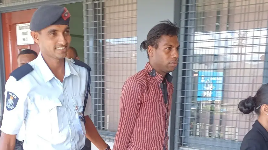 Ananaisa Ono escorted by Police Krishneel Prasad at Magistrates Court in Labasa. 