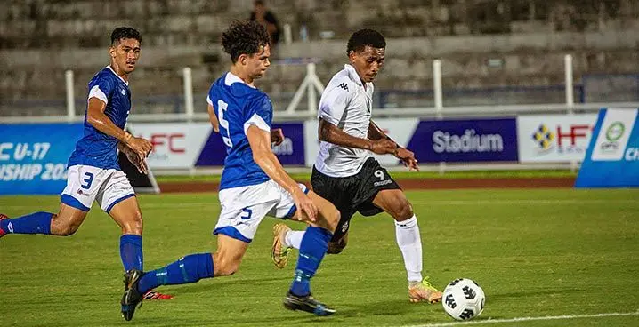 Digicel Fiji Under-17 football striker Salimoni Ravonokula dribbles his way past a Samoan defender during their group clash of the OFC U17 Championship playoffs at the ANZ Stadium, Suva, Fiji won 3-0. Photo: Leon Lord