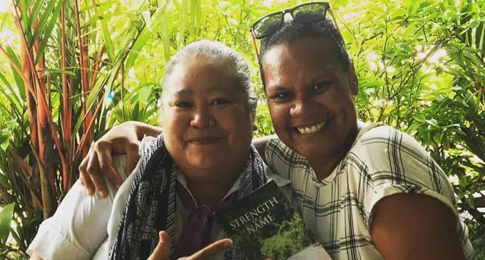 Tulia Nacula (right) with her new novel ‘Strength of a Name’ and design and layout artist Lynette. Photo: Katrina Igglesden