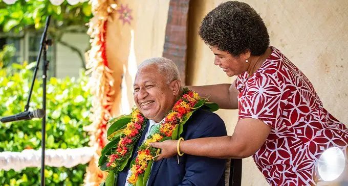 Adi Lewakikau Loaloa garlands the Prime Minister Voreqe Bainimarama at the opening of the Rewa Provincial Council meeting yesterday at Lomanikoro Village. Photo: Leon Lord