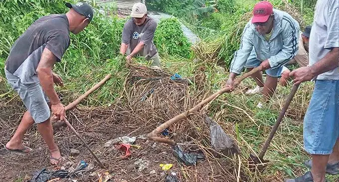 Members of Exodus clean up a physically-challenged man’s home in Naikabula, Lautoka.