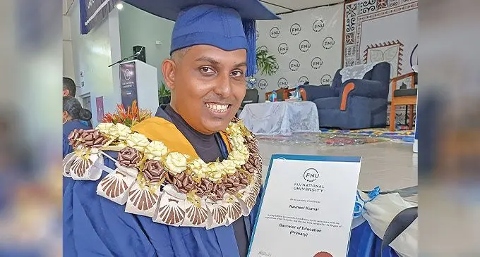 Navneel Kumar with his degree at the Fiji National University graduation ceremony in Labasa on April 24, 2024. Photo: Shratika Naidu