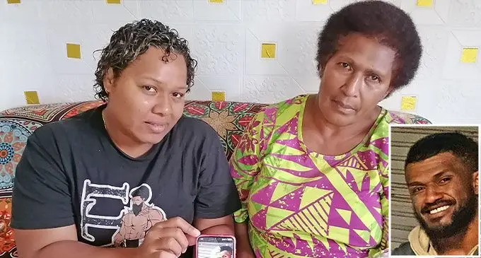 From left; Mere Dawai and Loata Marawa (Varo’s mother) holding the photo of Kamenieli Varo (inset) at Navakai in Nadi. Photo: Mereleki Nai