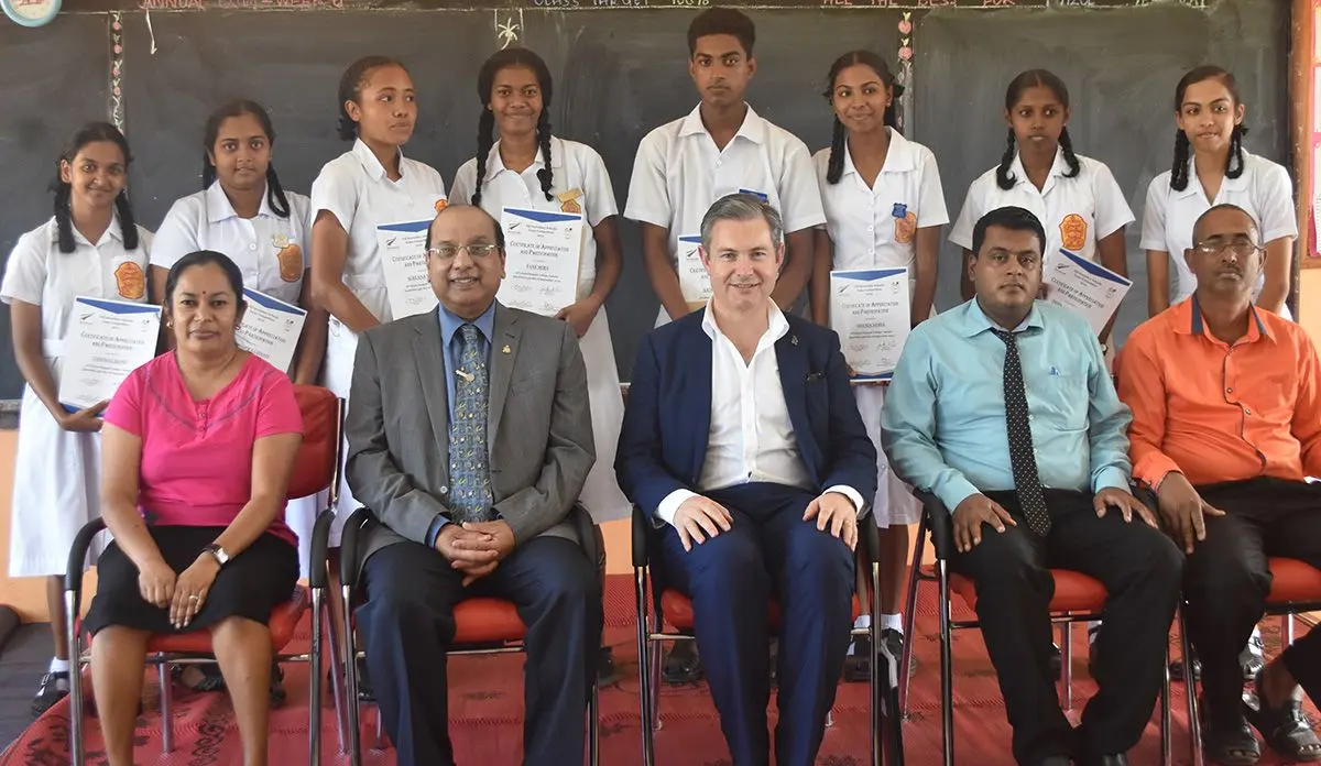 Delegates from Ministry of Education, Co‑chair of the Fiji Association of Auckland Dr Satendra Singh (second from left), NZ High Commissioner to Fiji Jonathan Curr (third from left) with students of Labasa Sangam (SKM) College on September 12, 2019. Photo: Mohammed Zulfikar