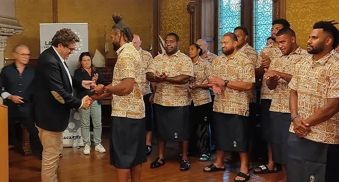 Flying Fijians captain Waisea Nayacalevu, with fellow team members and the Mayor of Libourne, Philippe Buisson, in France. The Flying Fijians will be based in Libourne during the 2023 Rugby World Cup. Photo: Supplied