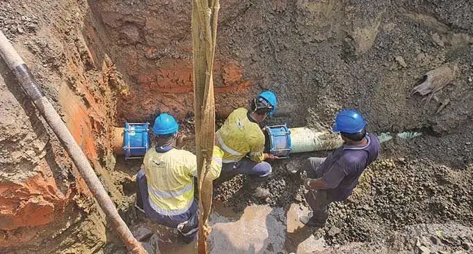 Water Authority of Fiji workers tending to the burst sewer main on Denarau Road.  Photo: Water Authority of Fiji