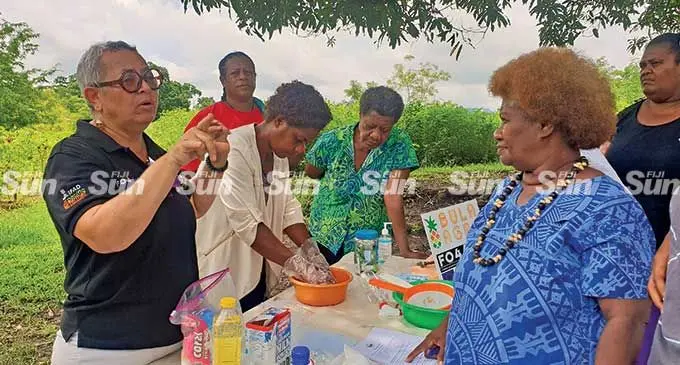 Tel-A-Woman coordinator, Flolyn Simpson (first from left) speaking to the residents of the  Daulomani Safe Home in Lautoka. Photo: Nicolette Chambers
