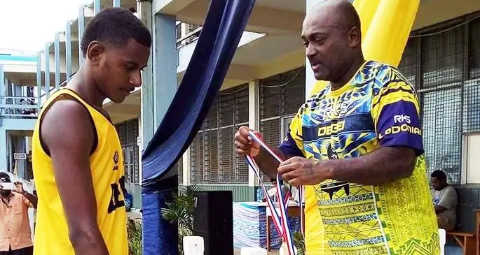 Ratu Kadavulevu School athlete Sailasa Bolatagici of Degei House receives his gold medal for the Intermediate Boys high jump event. Photo: Supplied