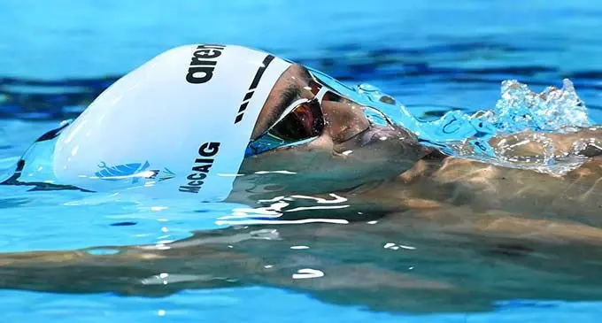 Hansel McCaig broke a 16-year0old national record in the 100metres Freestyle open during the FINA World Championship in Melbourne, Australia.