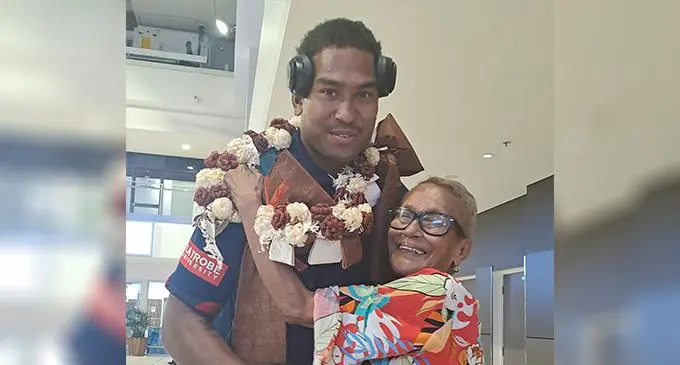 Melbourne Rebels’ lock Angelo Smith is welcomed by his grandmother Philo Smith at the Nadi International Airport on January 26, 2023. Photo: Waisea Nasokia