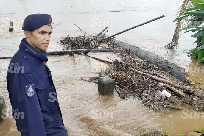 Navua Police officer, Captain Richard Wise keeping close watch flood water in Navua River on April 8, 2020. Photo: Ronald Kumar.