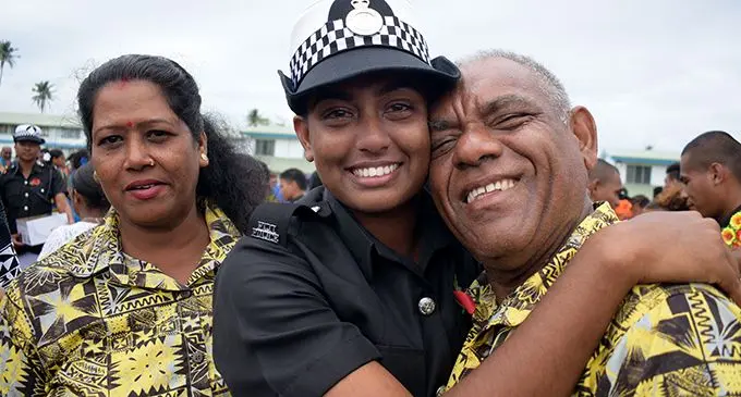 An emotional Shimona Jeet with her parents Premila Wati and Mahen Chand after Police Pass out Parade in Suva on October 18, 2019. Photo: Ronald Kumar.