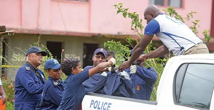 Fiji Police Forensic Science Services officers place the late Chand Kuar’s body onto the tray of a Police truck at Koronivia on September 14, 2023. Photo: Ronald Kumar