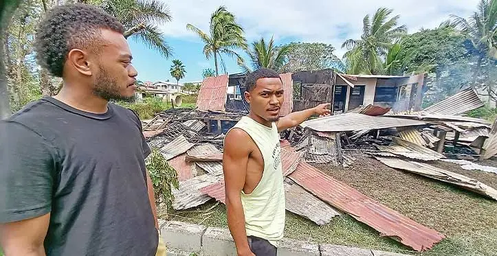 Kemueli Seeto and Viliame Elia explain how they pulled late Ramesh Chandra out of the burning home in fire in Nausori on August 23, 2023. Photo: Ronald Kumar