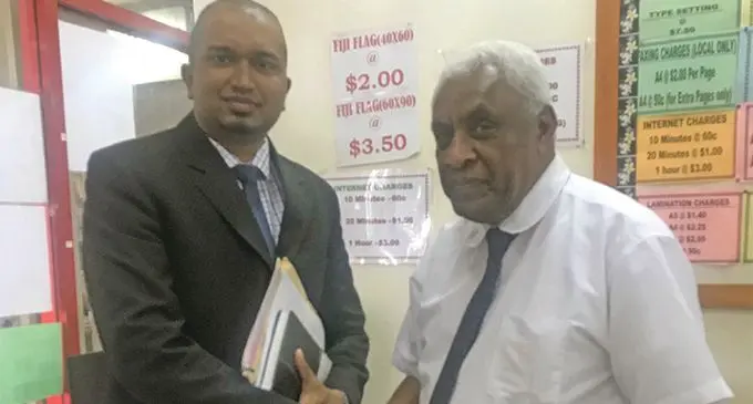 Lawyer Emmanuel Narayan (left) with Nemani Delaibatiki.